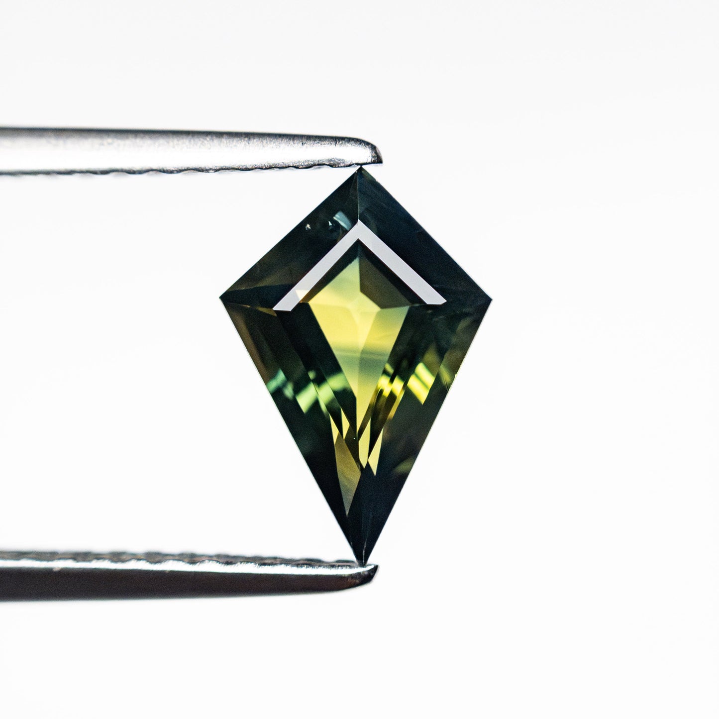 0.95ct 9.25x6.33x3.11mm Kite Step Cut Sapphire 25386-08