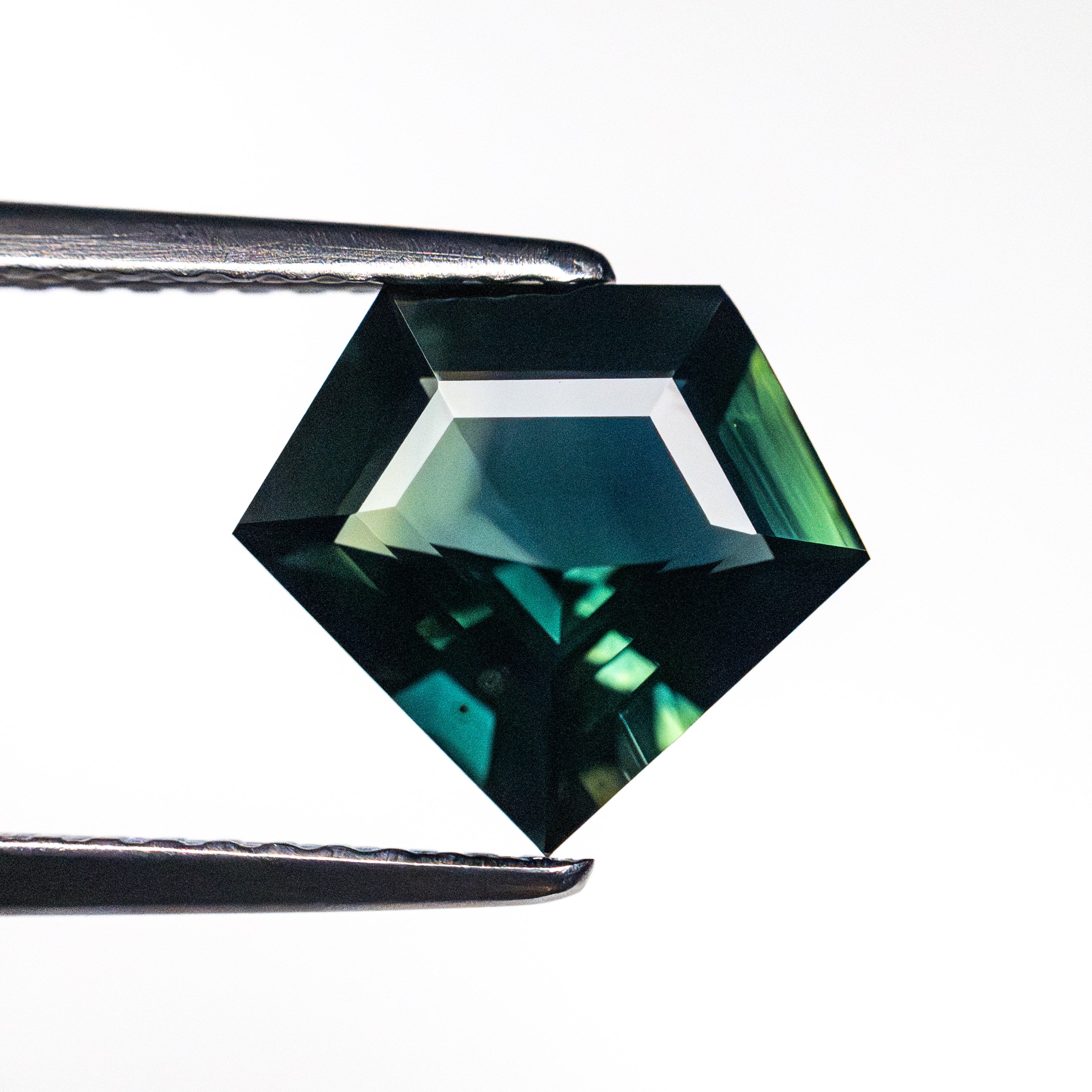 1.98ct 8.73x9.70x3.95mm Shield Step Cut Sapphire 26726-02 – Liza